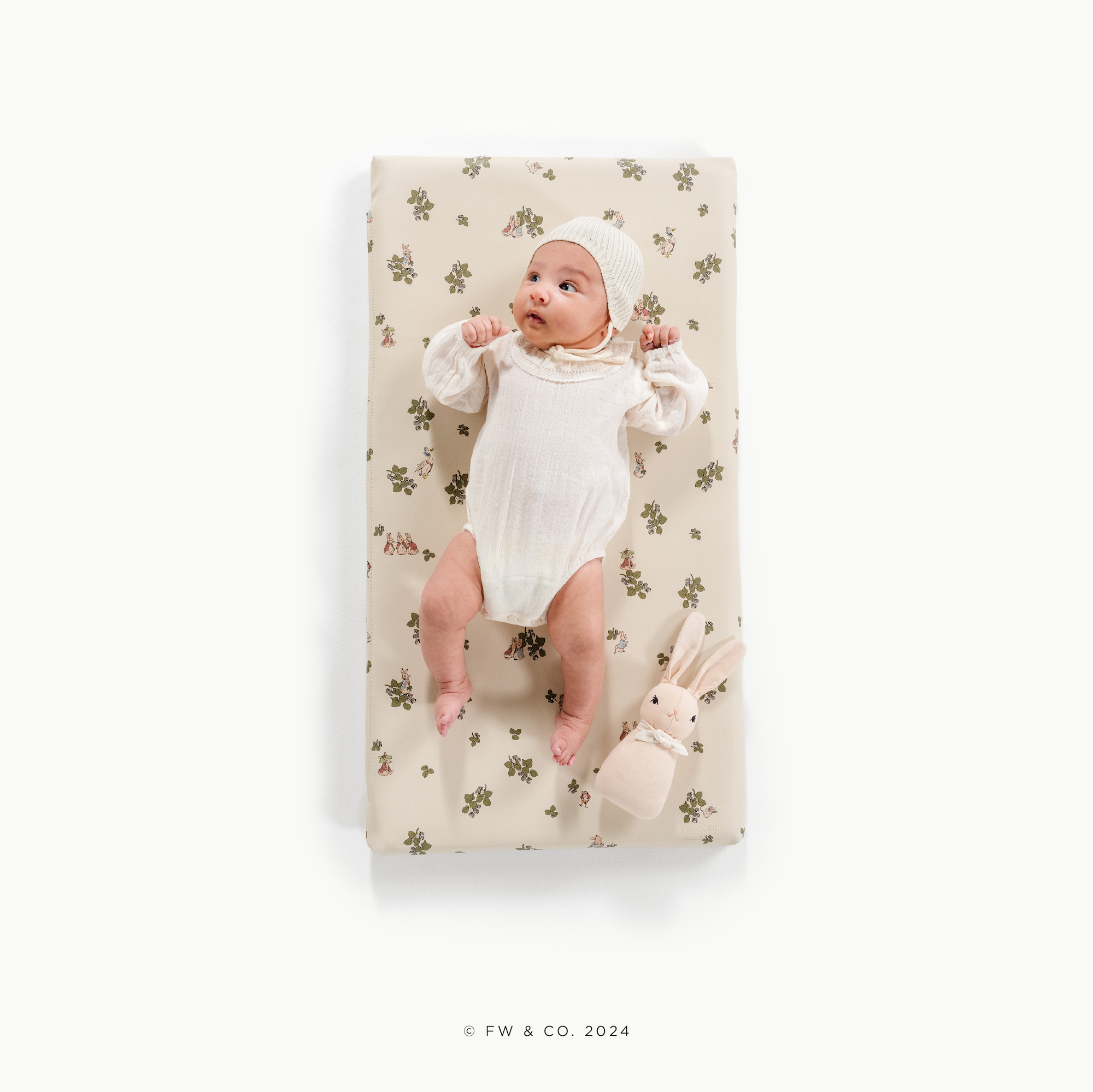 Peter Rabbit™ (on sale)@overhead of baby on padded micro+ mat
