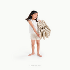 Peter Rabbit™ (on sale)@little girl holding folded ball pit