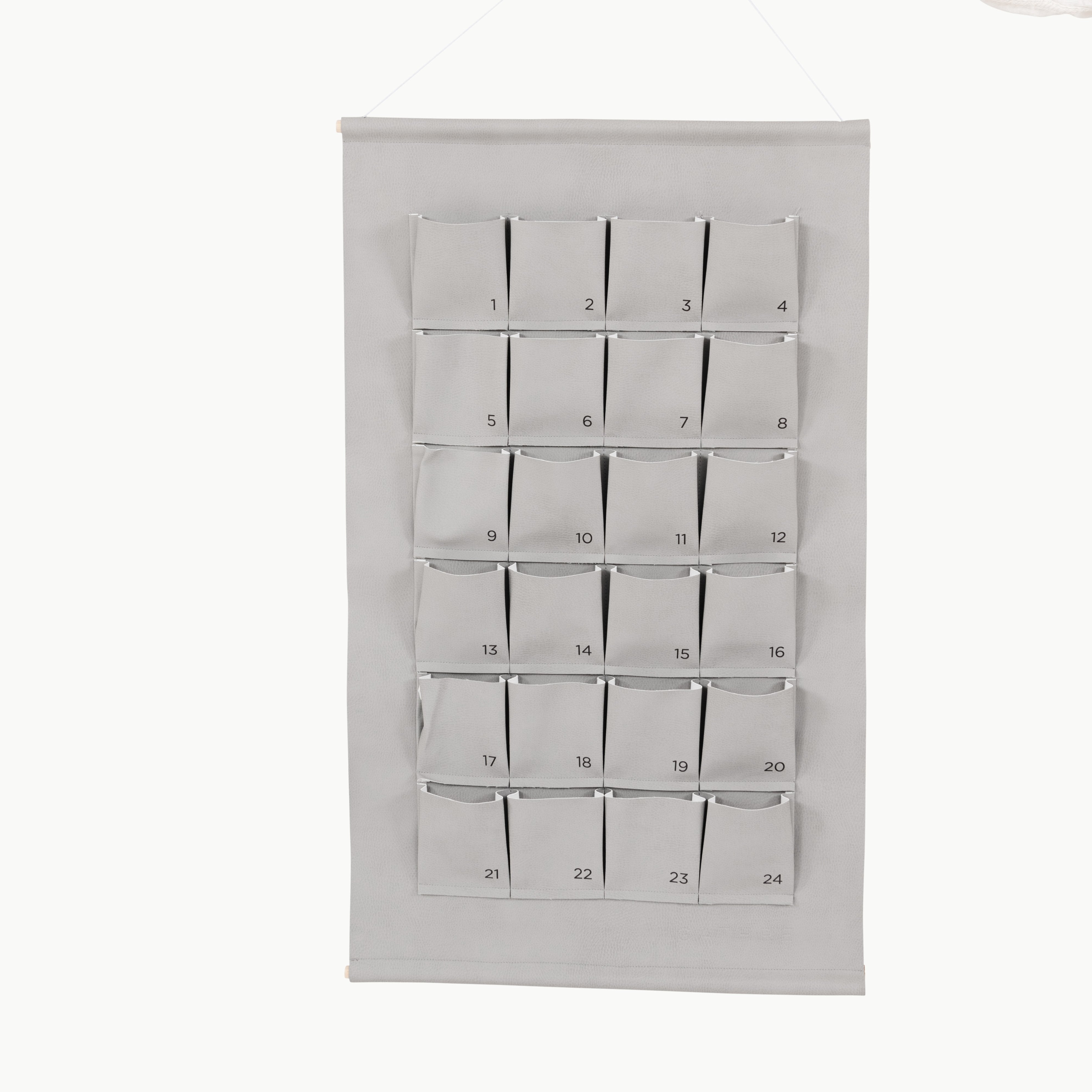 Pewter (on sale)@Woman holding the Small Pewter Advent Calendar