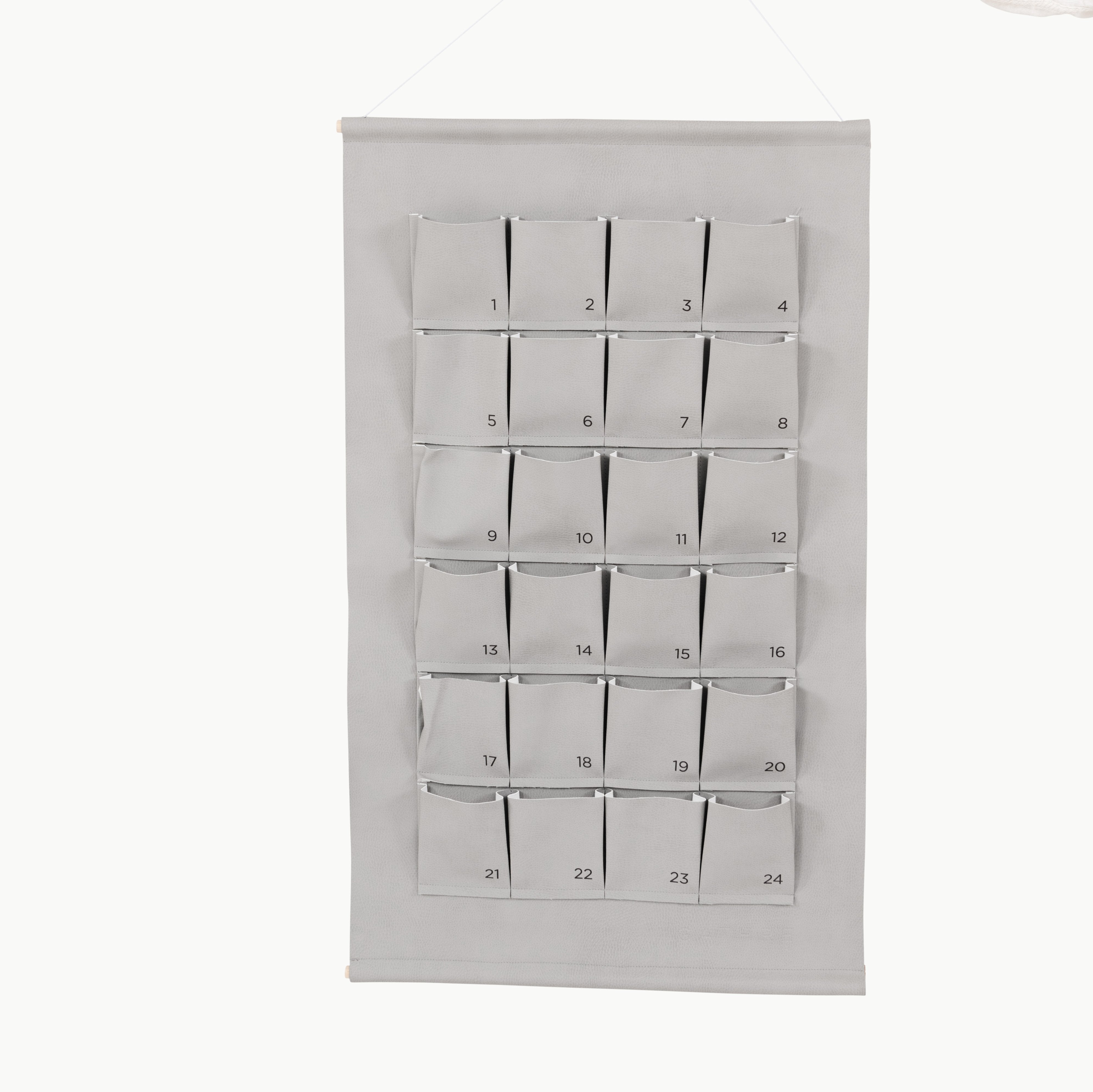 Pewter (on sale)@Woman holding the Small Pewter Advent Calendar