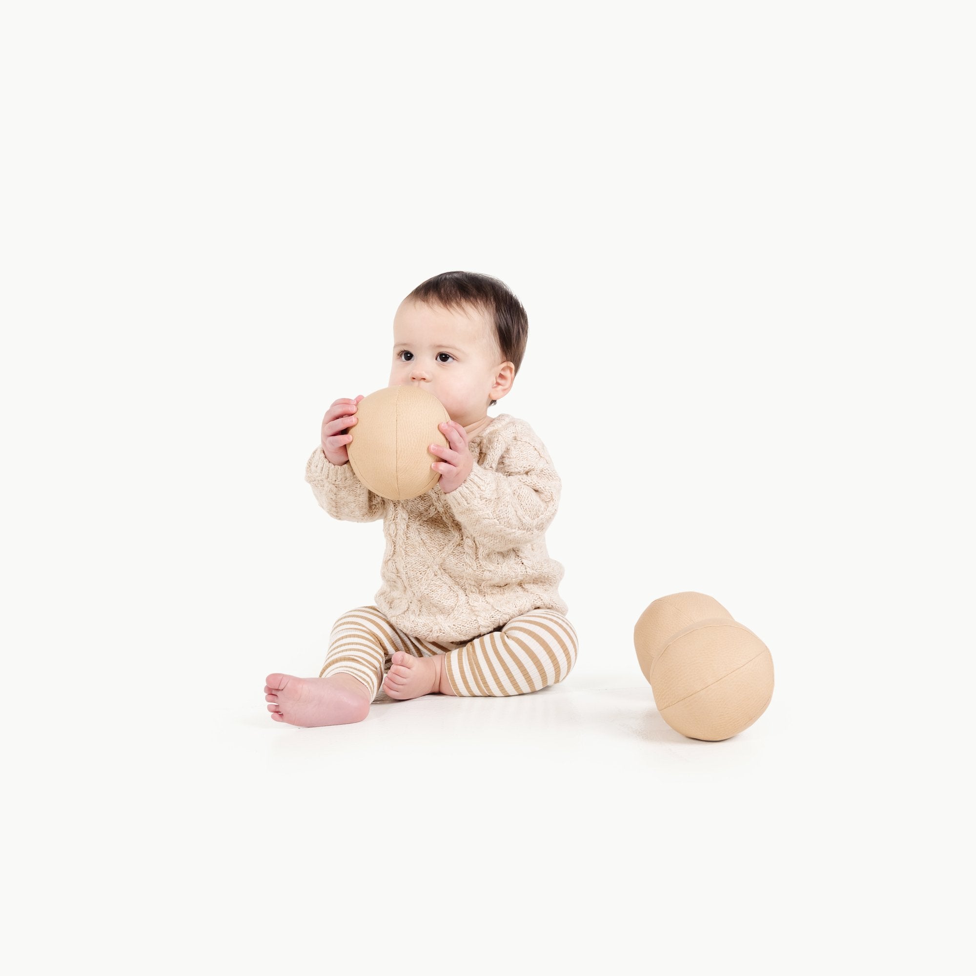 Untanned@Kid playing with the Untanned Play Ball Set