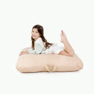 Pomelo (on sale) / Square@Kid laying on the Pomelo Square Floor Cushion