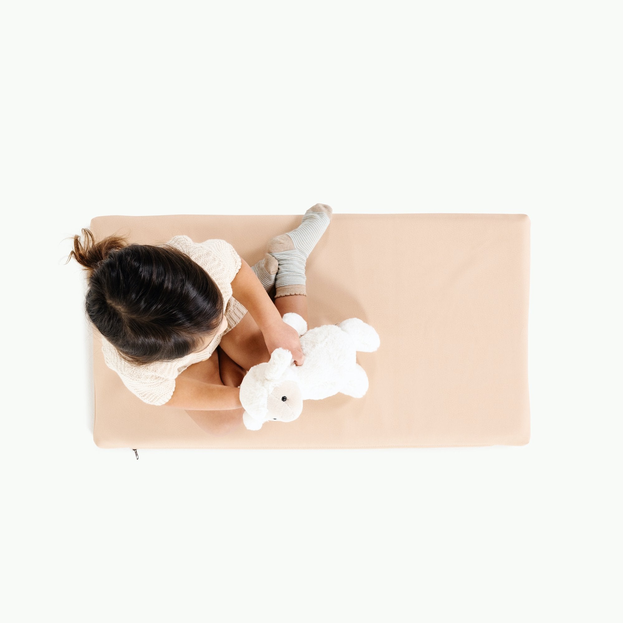 Pomelo@Overhead of kid sitting on Pomelo Padded Micro+