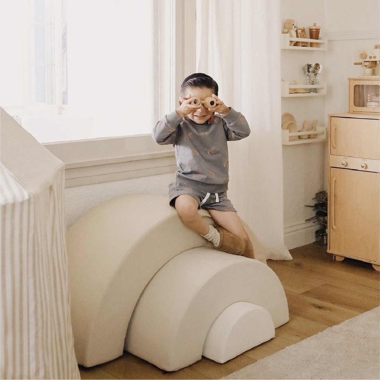 Kid playing with the Gathre Arc Playset