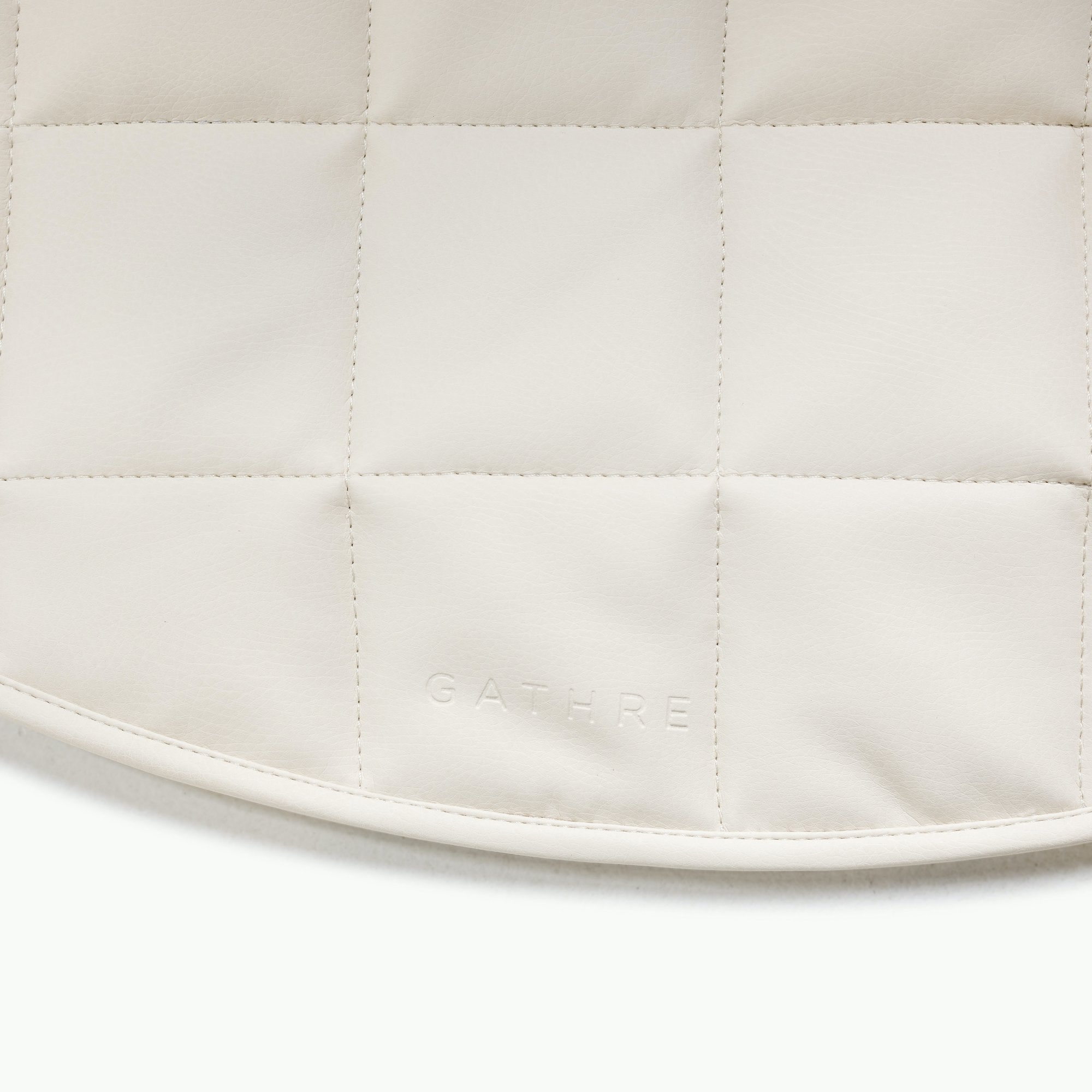 Ivory / Circle@Gathre deboss detail on the Ivory Mini Circle Quilted Mat