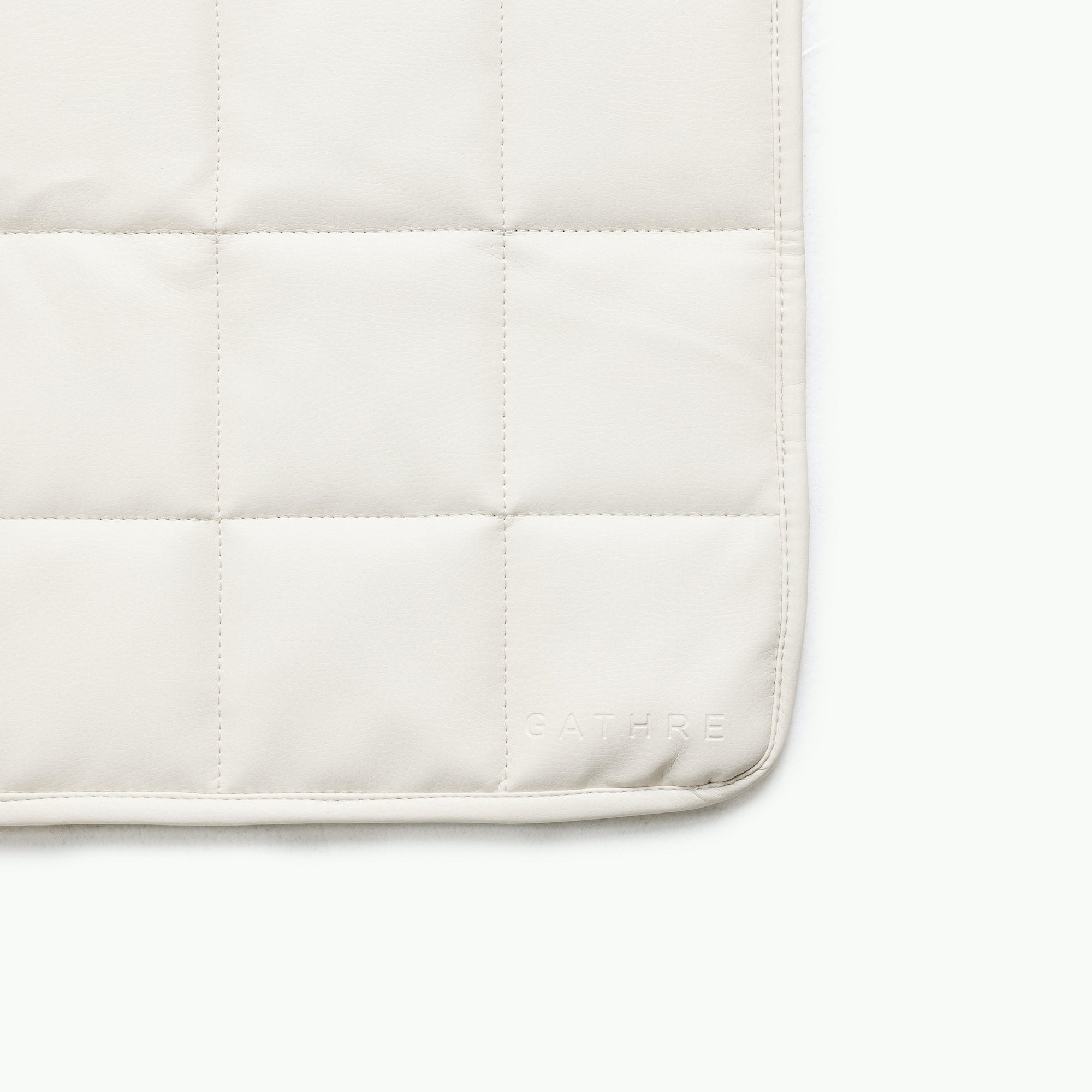 Ivory / Square@Gathre deboss detail on the Ivory Mini Square Quilted Mat