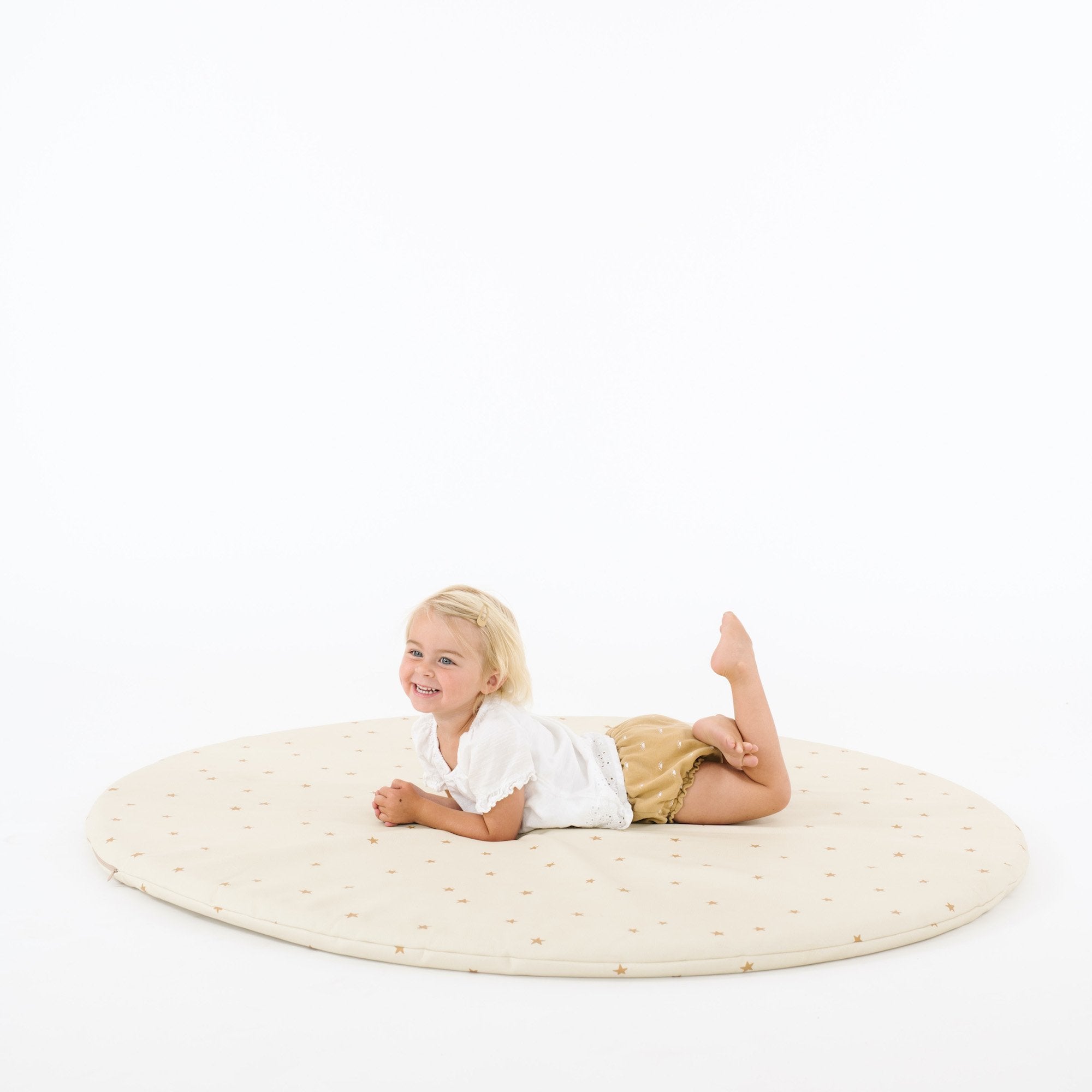 Stars (on sale)@girl laying on Stars padded midi circle