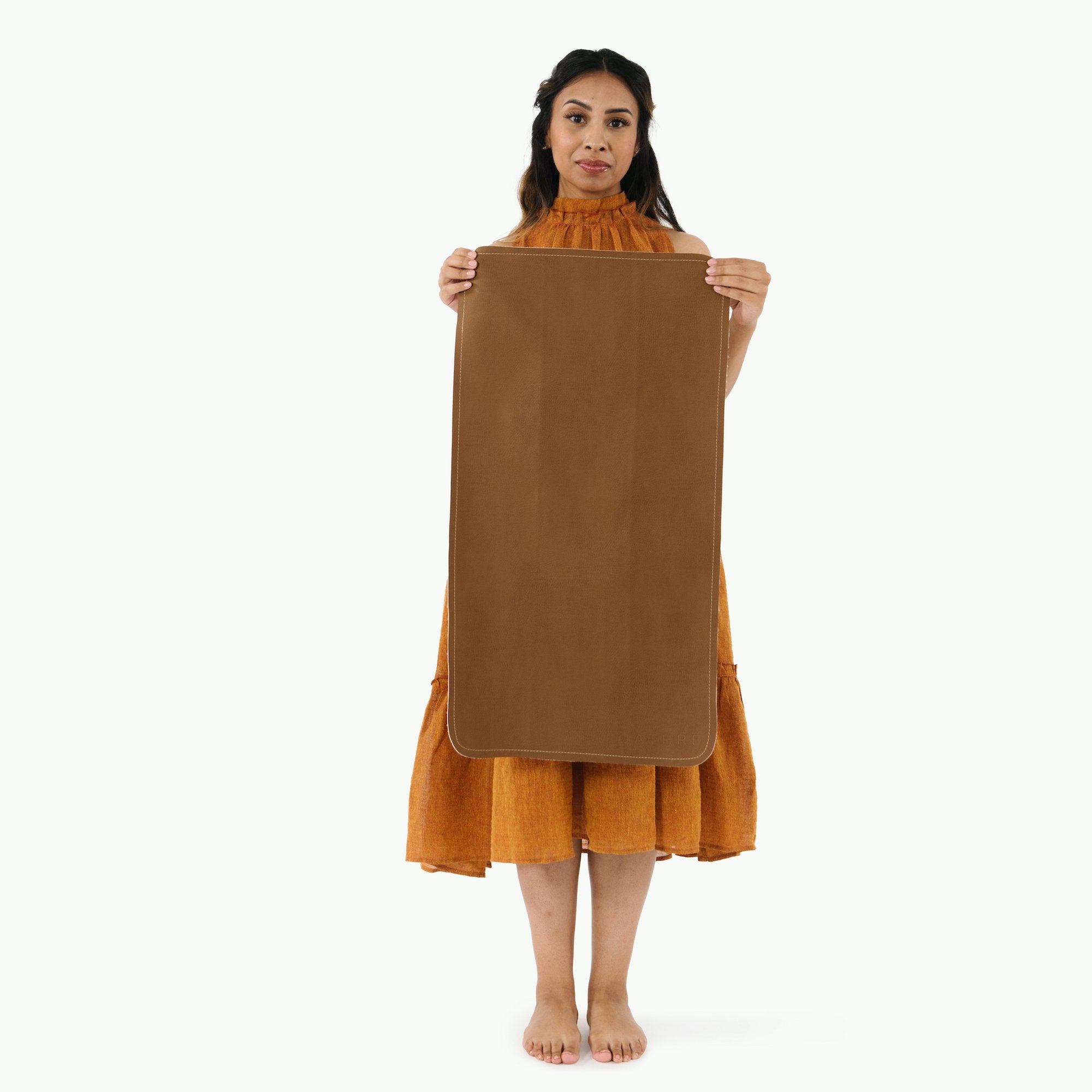 Teak (on sale)@woman holding the teak micro+ mat