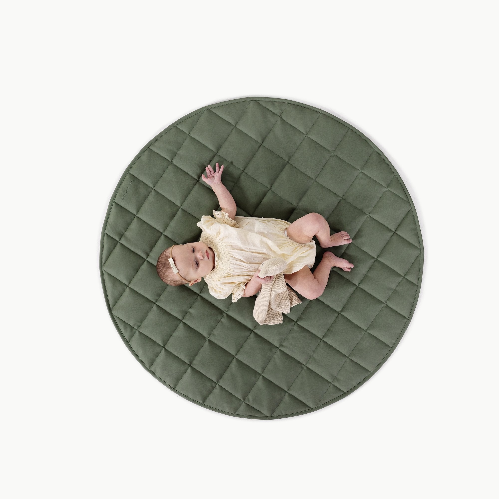 Thyme / Circle@Overhead of baby laying on the Thyme Circle Quilted Mat