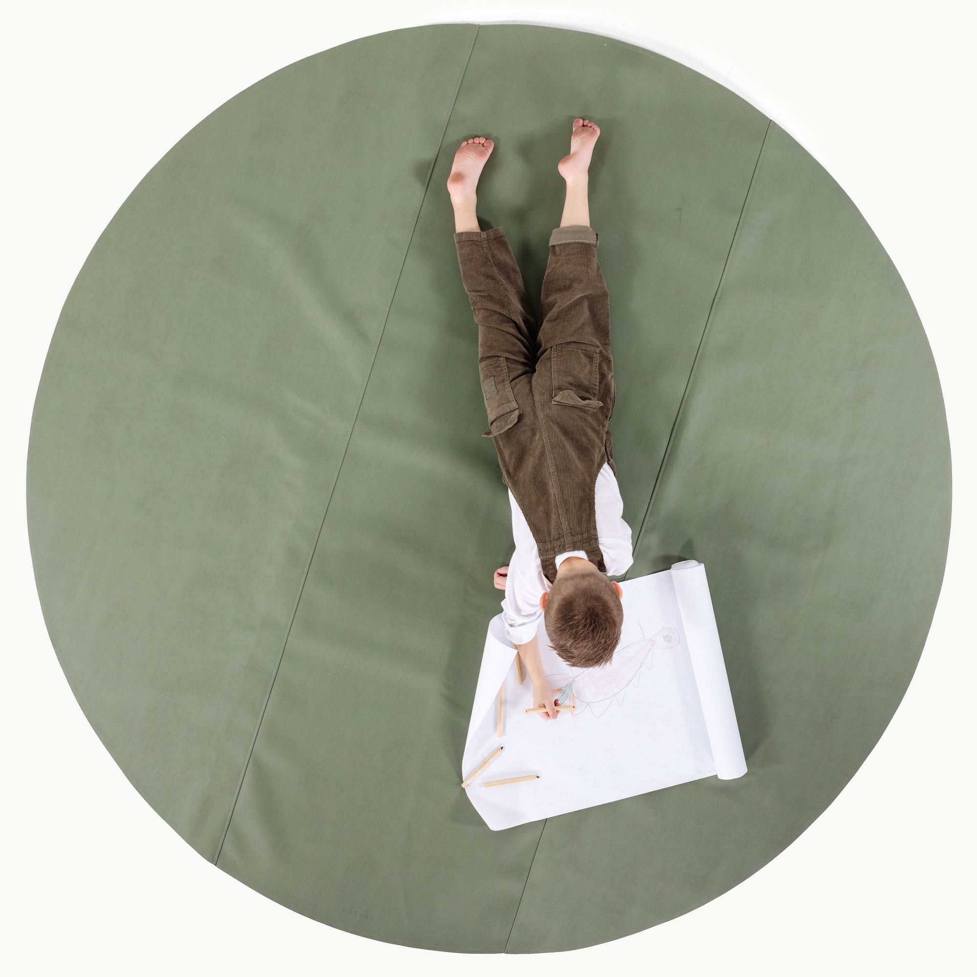 Thyme / Circle@Overhead of kid playing on the Thyme Maxi Circle Mat