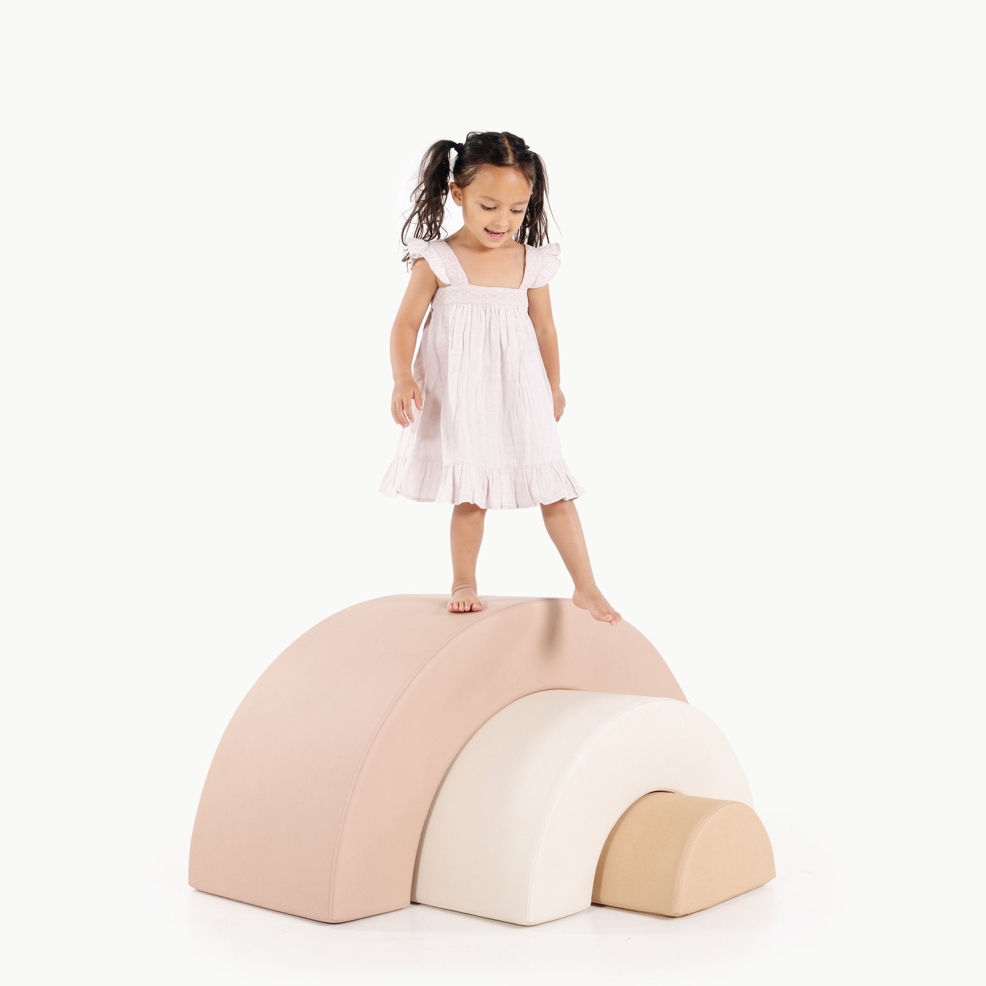 Tulle • Ivory • Untanned / Stackable Arc Playset@Arc Playset (Color) Kid playing on the Tulle Arc Playset