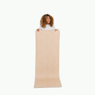 Untanned (on sale)@woman holding up the untanned large home mat
