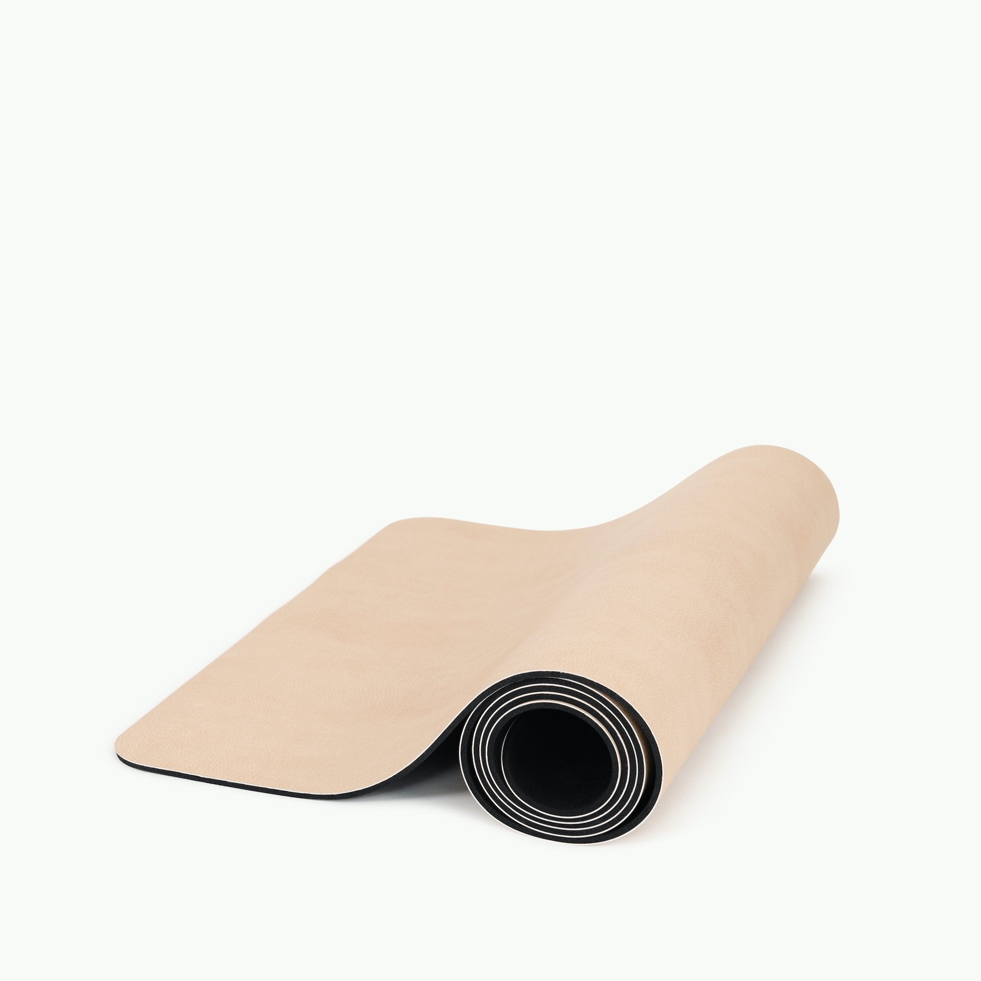Untanned (on sale)@the untanned large home mat rolled up