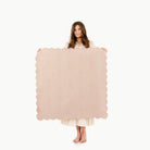 Untanned Scallop@Woman holding the Untanned Scallop Mini Mat