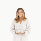 USA Map (on sale)@Woman holding a folded USA Map Mini+ Mat