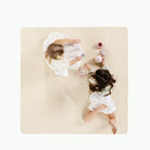 Wool (on sale) / Square@Overhead of kids playing on the Wool Square Midi Mat