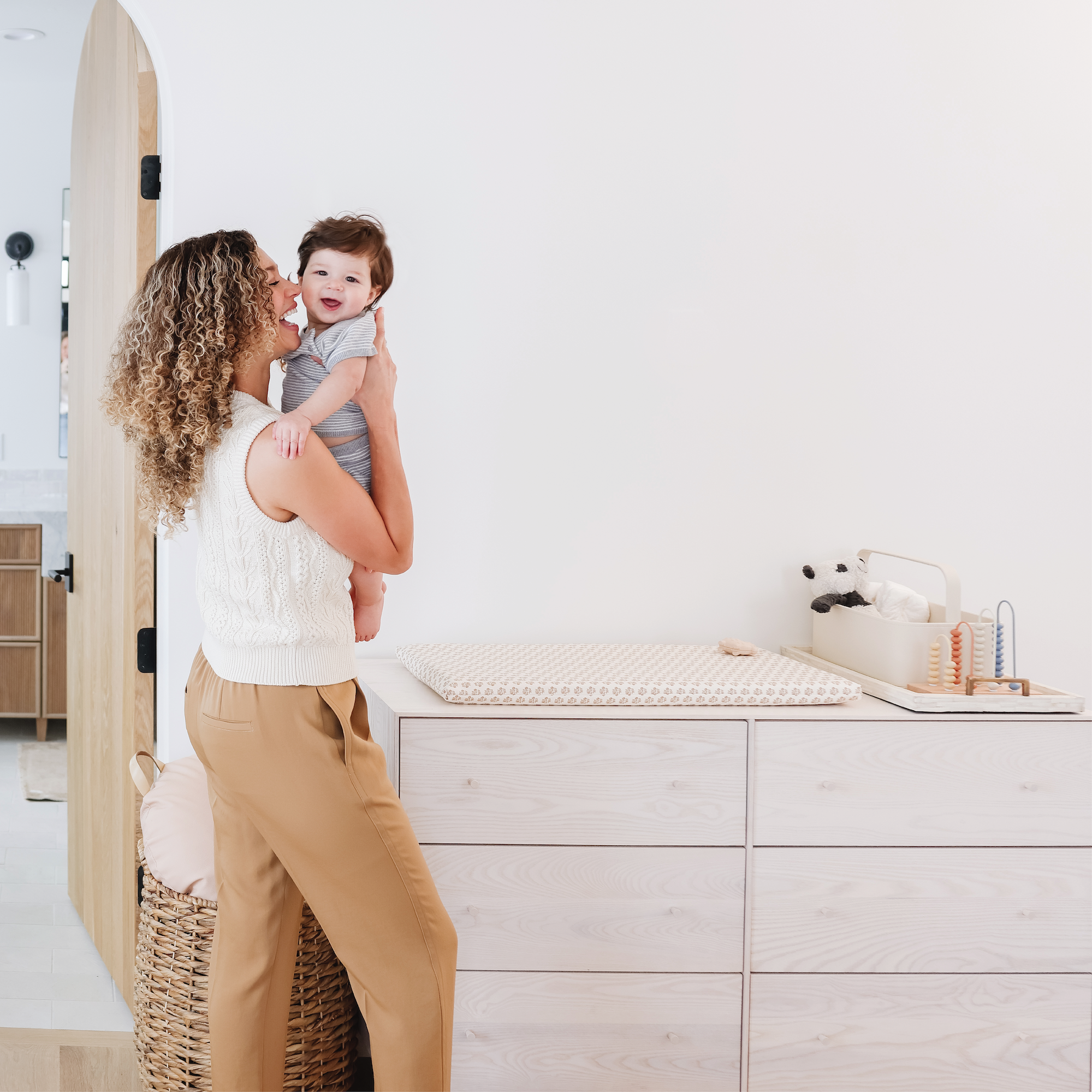 Bloom (on sale)@Mom holding baby by Bloom Padded Micro+