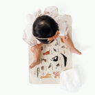 Animal Alphabet@Overhead baby sitting on the Animal Alphabet Micro mat