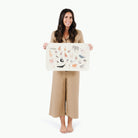 Animal Alphabet@Woman holding the Animal Alphabet Micro mat