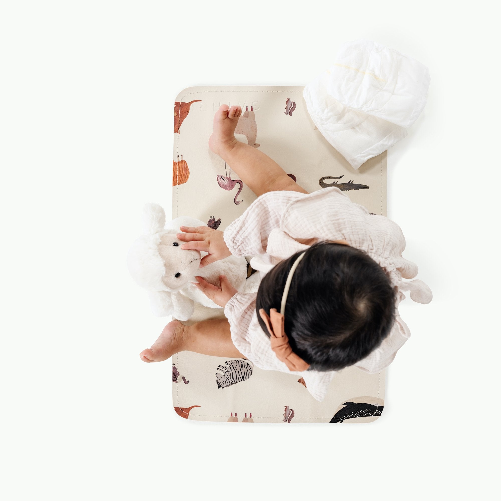 Menagerie@Overhead baby sitting on the Menagerie Micro mat