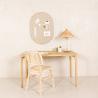 Millet@Millet Pinboard hanging on wall above a desk