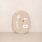 Millet@Millet Pinboard with object pinned on, leaning against wall