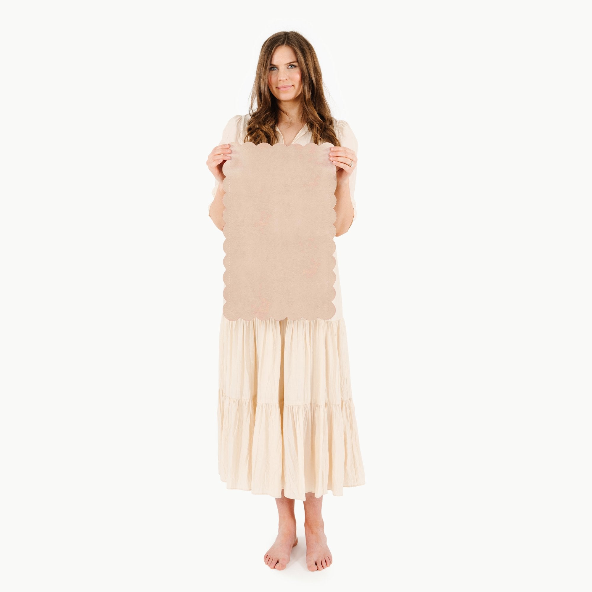 Untanned Scallop@Woman holding the Untanned Scallop Micro mat