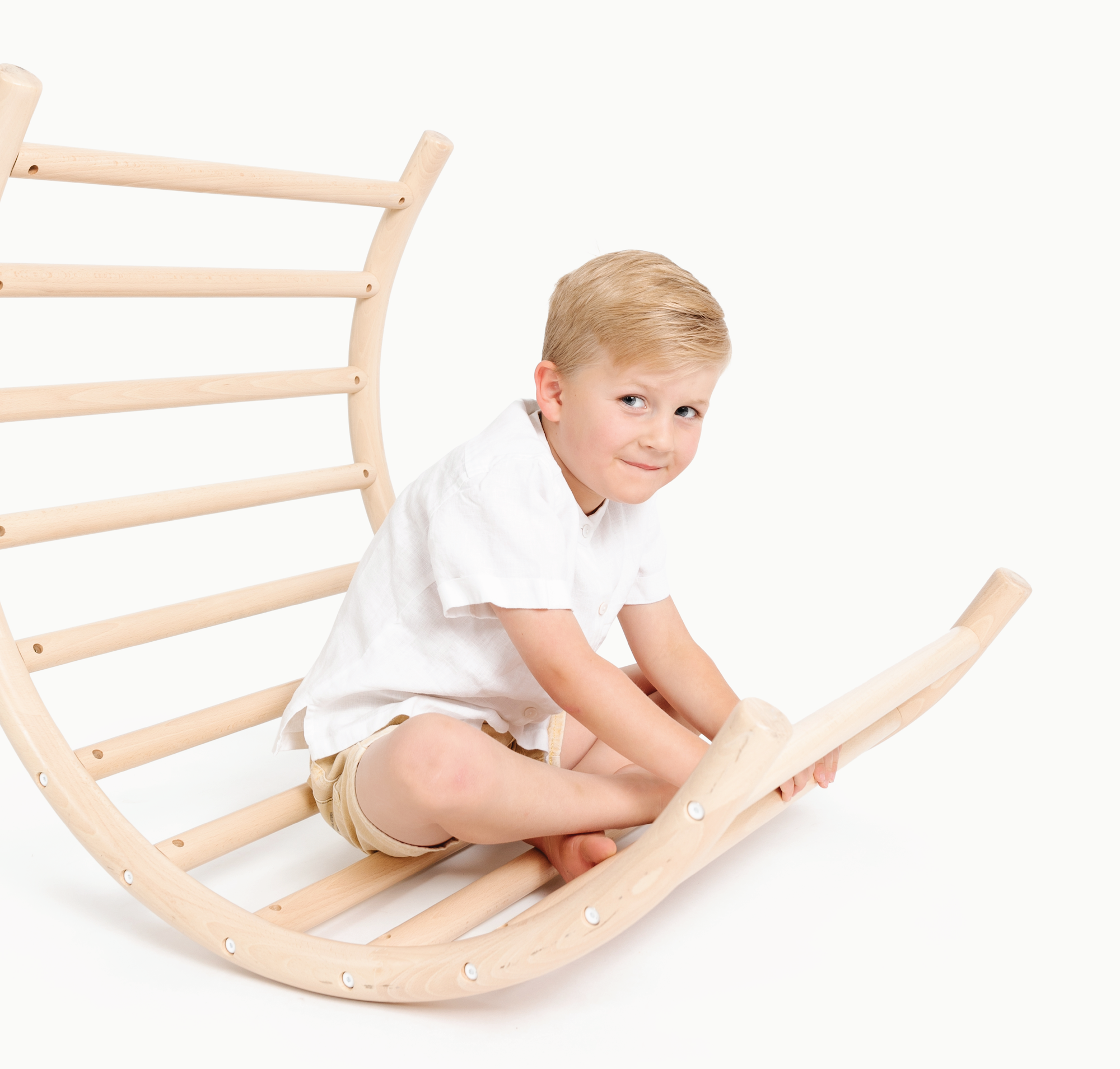 Boy sitting on Play Gym
