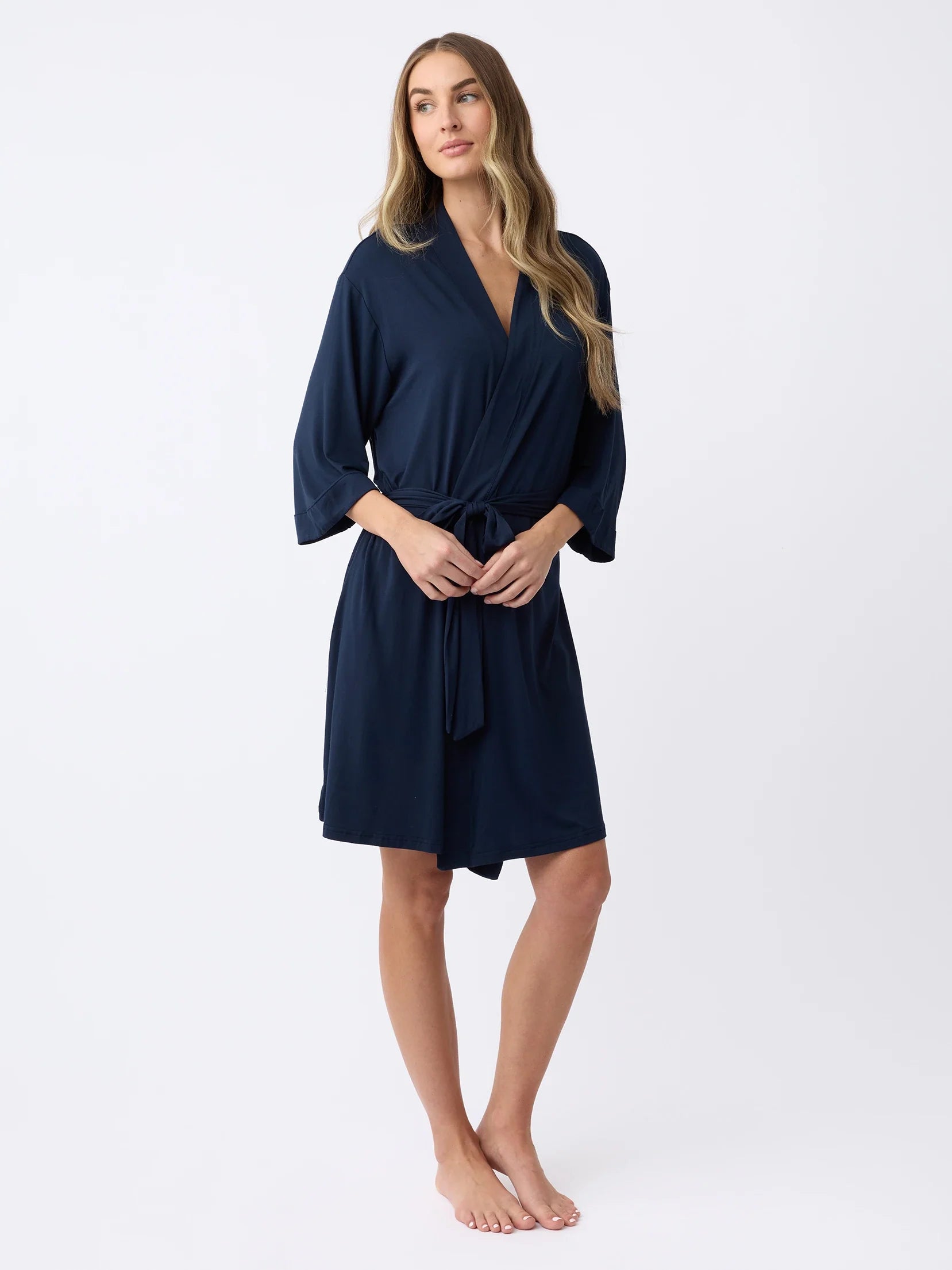 Navy@woman wearing a navy cozy earth robe