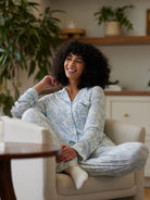 Sky Toile@woman wearing sky toile cozy earth pajamas