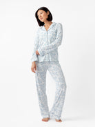 Sky Toile@woman wearing sky toile cozy earth pajamas
