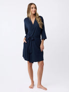 Navy@woman wearing a navy cozy earth robe