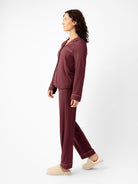 Burgundy@woman wearing burgundy cozy earth pajamas