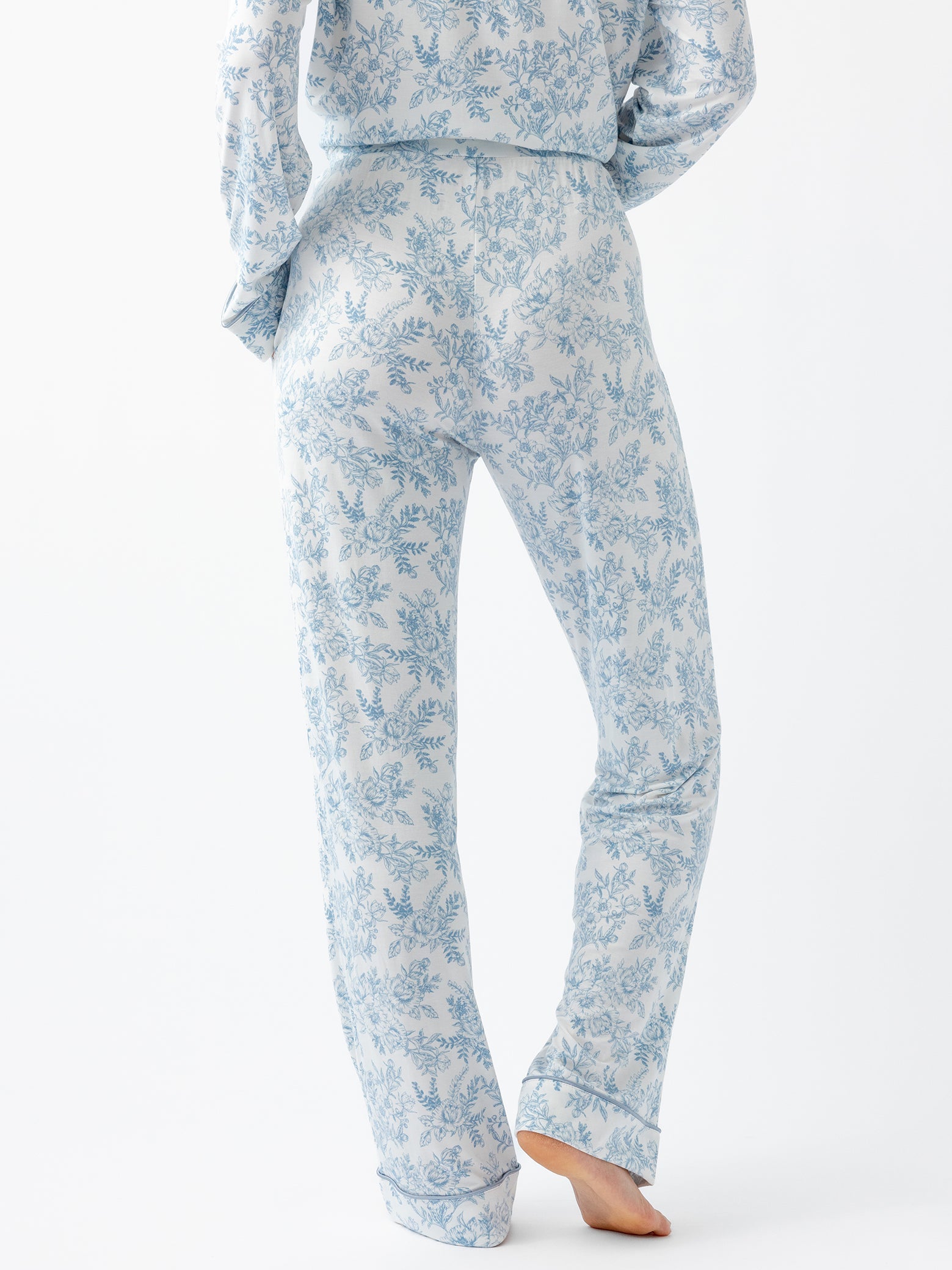 Sky Toile@woman wearing sky toile cozy earth pajamas