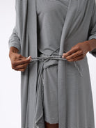 Eclipse Mini Stripe@woman wearing a eclipse mini stripe cozy earth robe