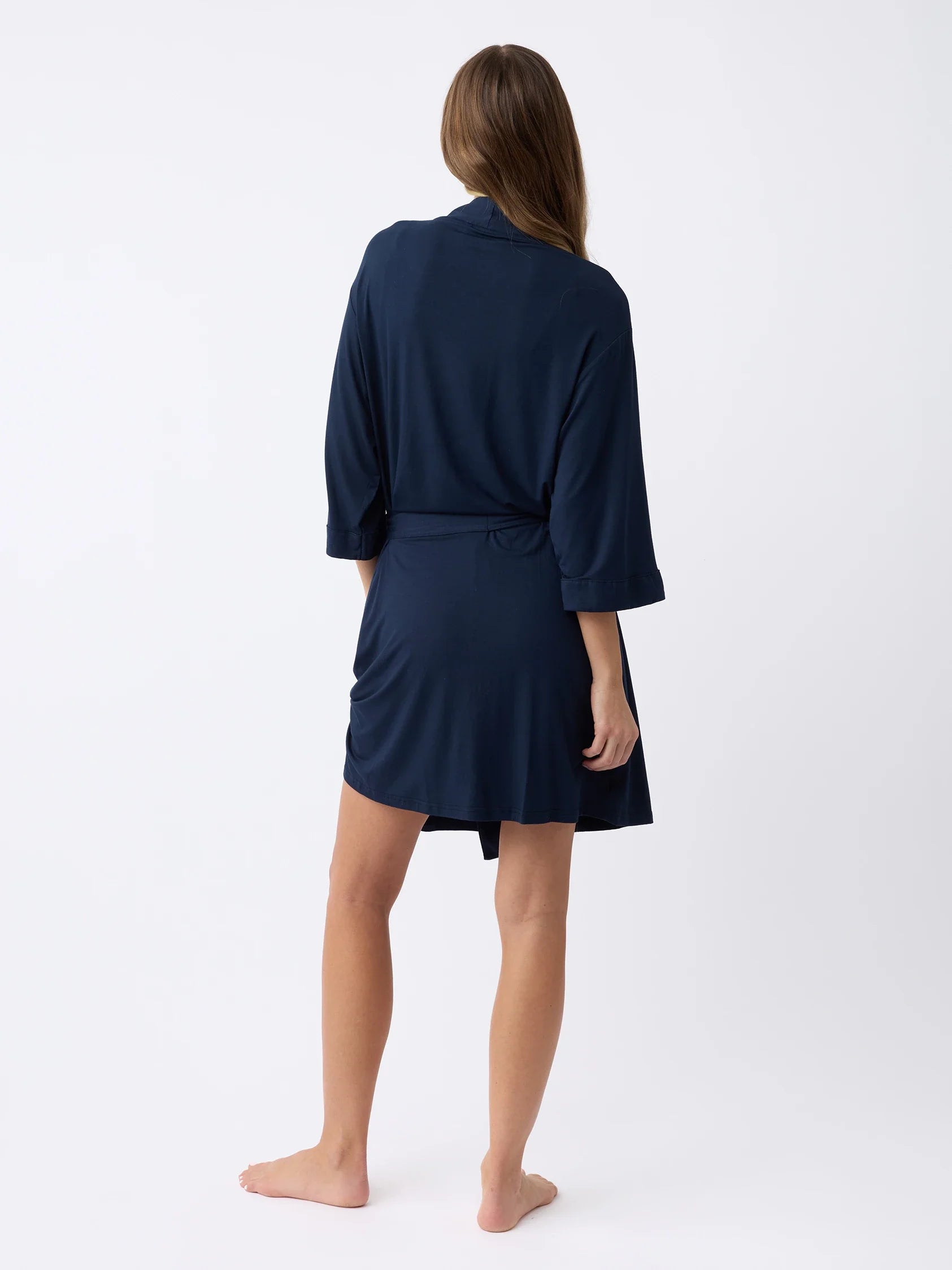 Navy@woman wearing a navy cozy earth robe