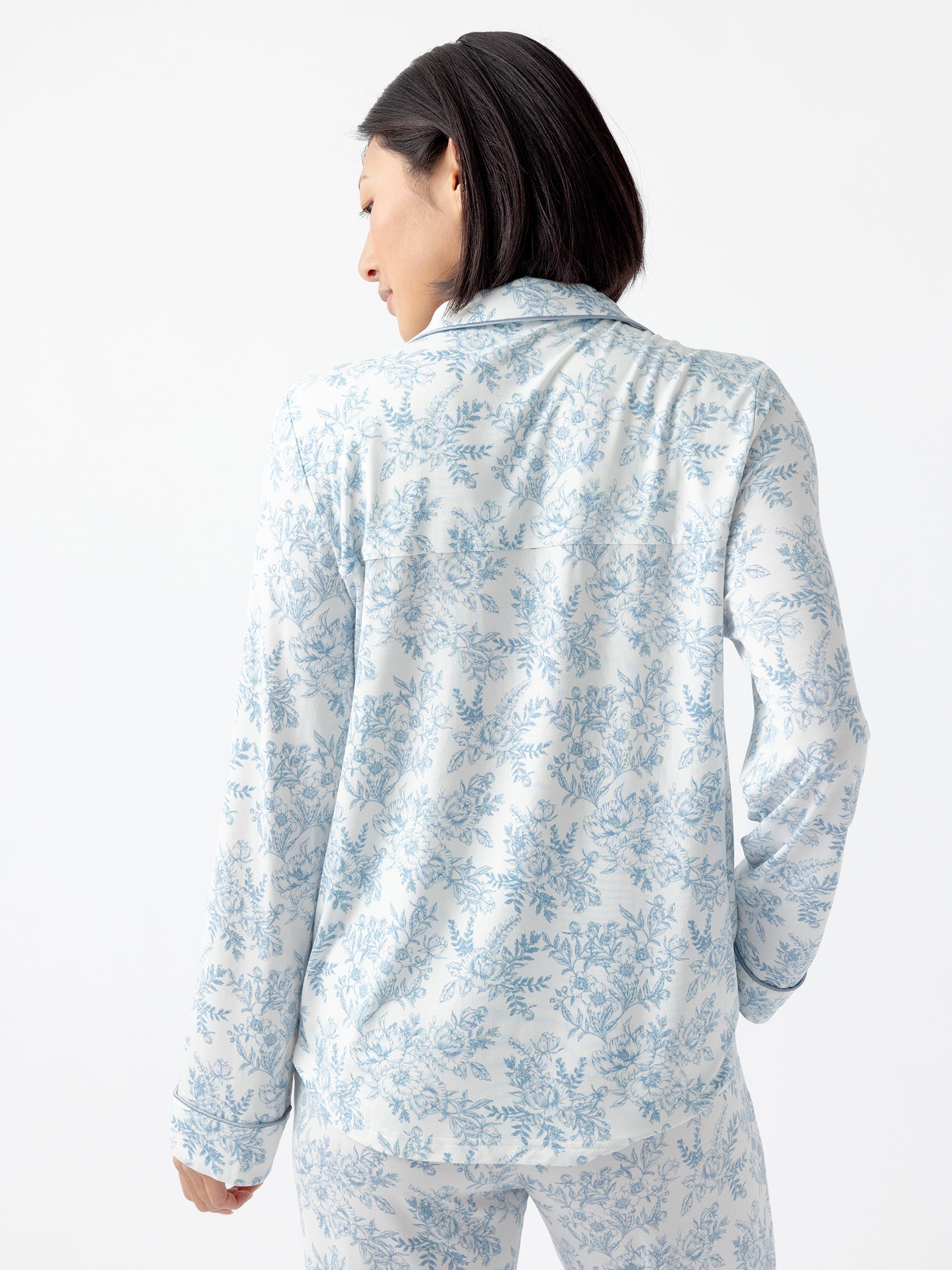 Sky Toile@woman wearing sky toile cozy earth pajamas
