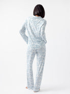 Sky Toile@woman wearing sky toile cozy earth pajamas