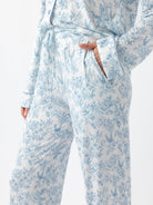 Sky Toile@woman wearing sky toile cozy earth pajamas