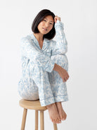 Sky Toile@woman wearing sky toile cozy earth pajamas
