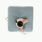 Amalfi / Square@overhead of girl on cushion