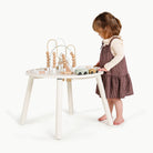 Biscotti@little girl playing with activity table