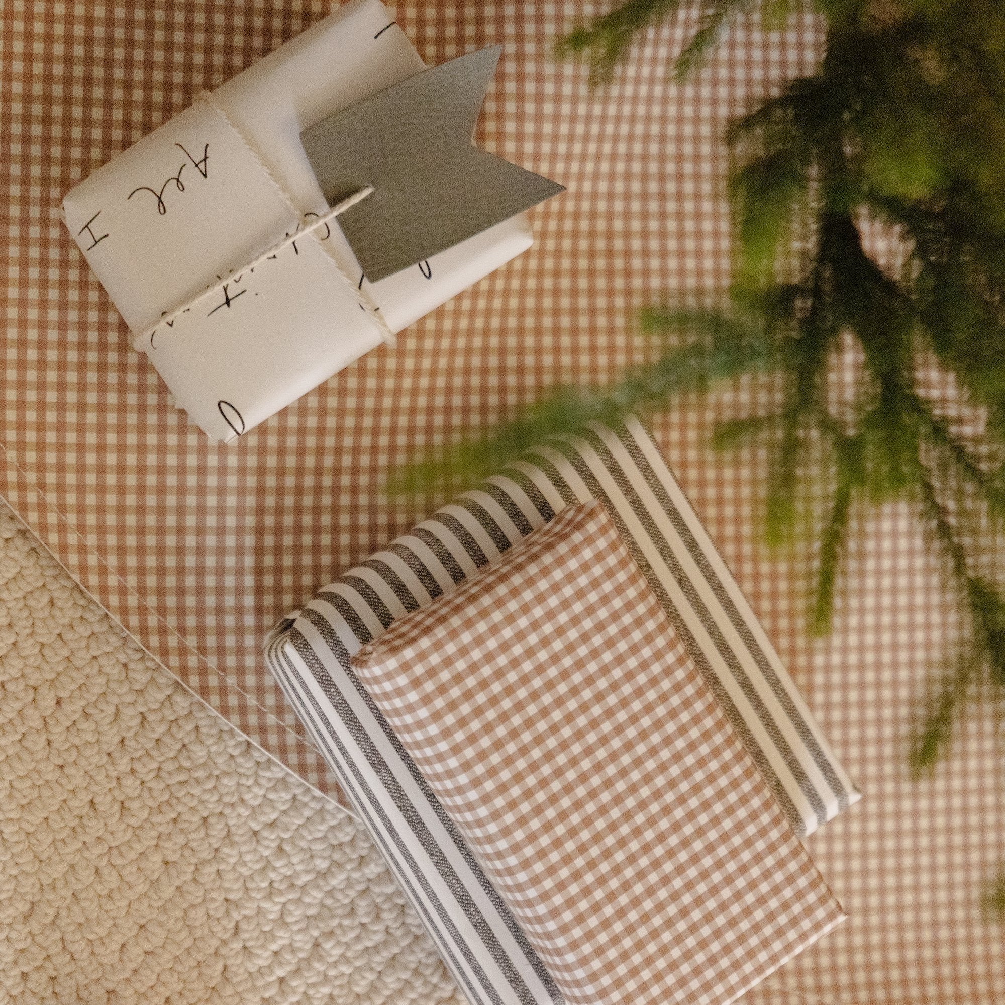 Bronze Check (on sale)@Overhead of Bronze Check Tree Skirt under tree 