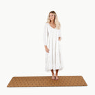 Camel Dash (on sale)@Woman standing on the large camel dash home mat