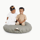Fern (on sale) / Circle@Kids sitting on the Fern Circle Floor Cushion