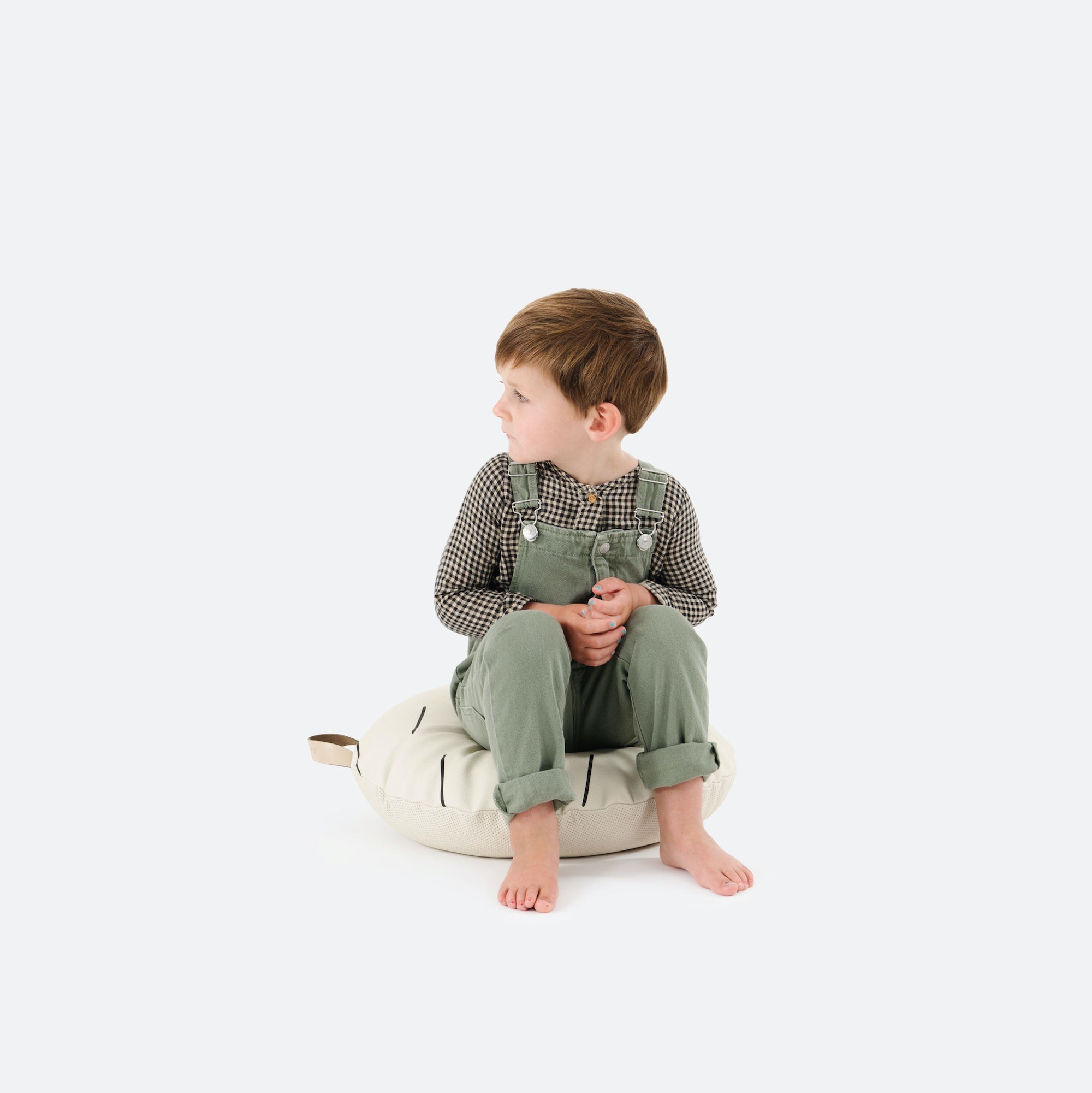 Blanc Dash (on sale)@little boy sitting on mini cushion