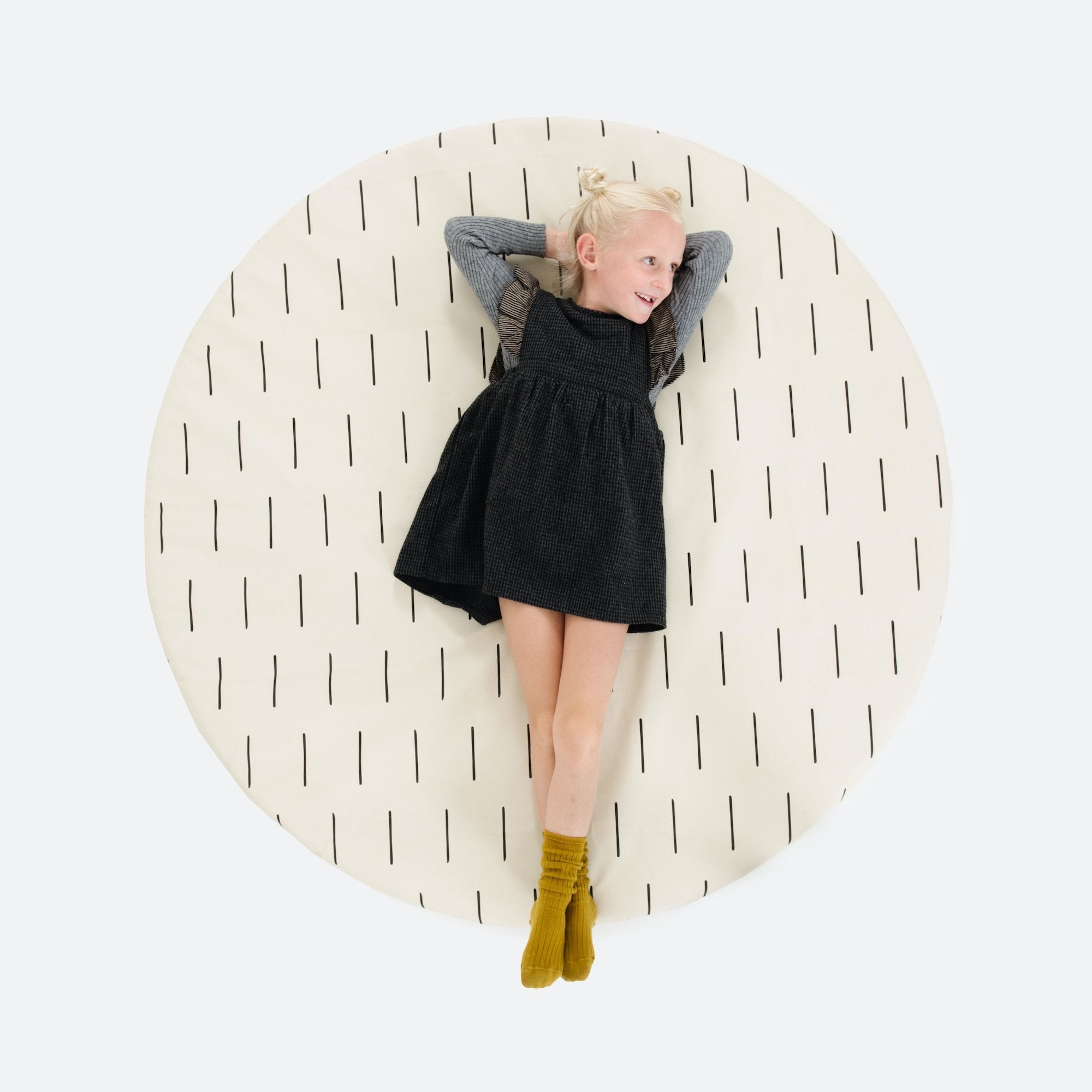 Blanc Dash (on sale)@kid laying on the padded midi circle