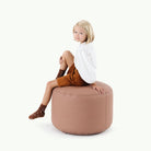 Sienna (on sale) / Circle@Kid sitting on the Sienna Circle Pouf