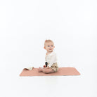 Sienna • Blanc (on sale)@baby sitting on the double sided micro+ mat