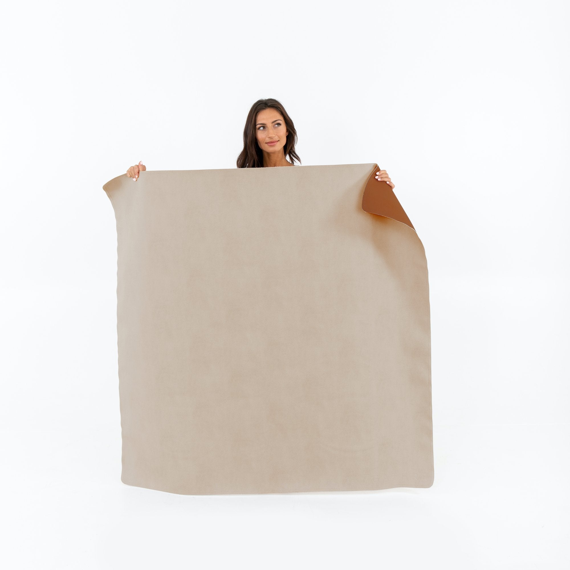 Ember • Ginger (on sale) / Square@woman holding the double sided midi mat